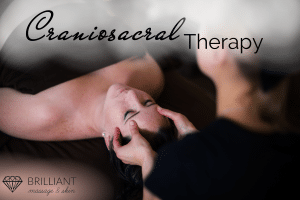 man lying on massage table with masseur in black shirt giving him a neck massage: text: craniosacral therapy