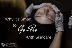 a girl having a facial from two hands with gloves: text: why it's smart to go-pro with skincare