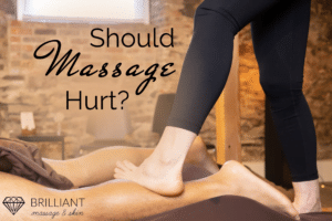 therapist giving an ashiatsu massage to a client: Should massage hurt?