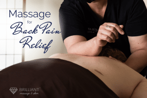 a massage therapist in black shirt giving a back massage with a client lying on the massage table: Text: massage for back pain relief