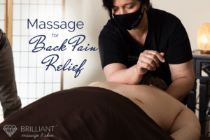 back massage performed to a client: text: massage for back pain relief
