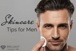 gorgeous man cleaning his face with a round cotton pad: text: skincare tips for men