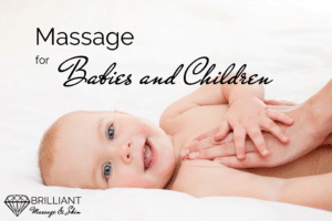 smiling baby having a massage: text: massage for babies and children
