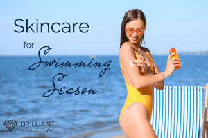 A girl in one-piece yellow swimsuit with orange sunglasses applying sunscreen on her arm along the beach. Text: skincare for swimming season