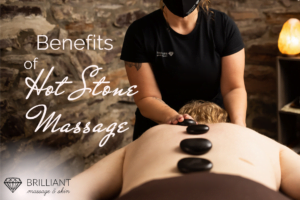 having a hot stone massage: text: benefits of hot stone massage