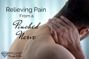 guy holding his neck: text: relieving pain from a pinched nerve